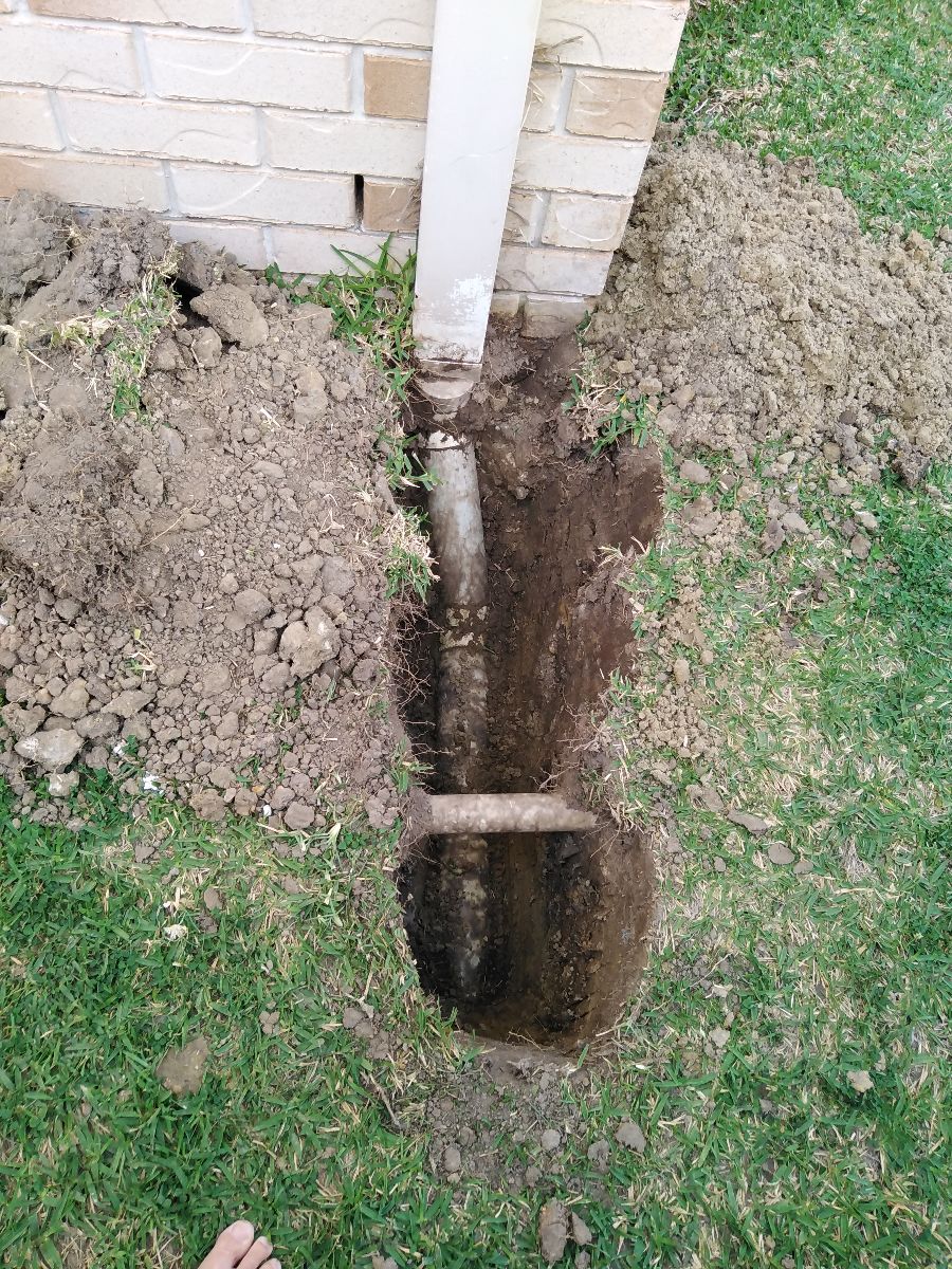 Keith dug a drainage trench down the length of the house