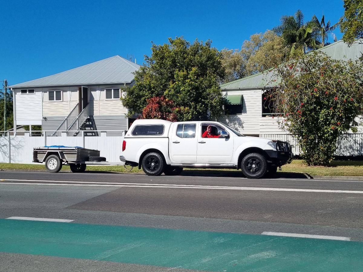 Keith collects her in the ute.