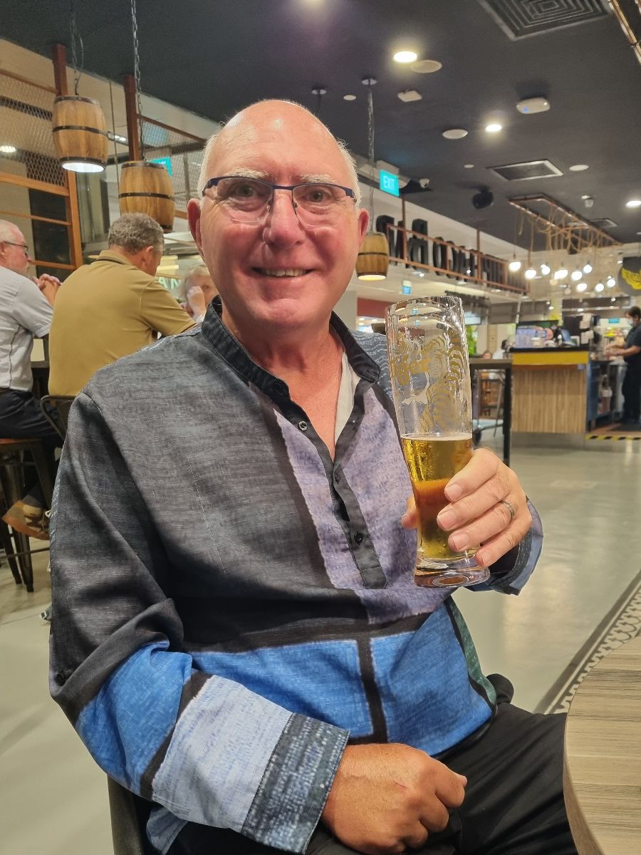 Keith enjoys a Tiger Beer at Singapore Airport en route to Sri Lanka