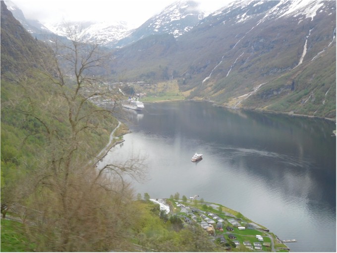 Looking down the Geiranger Fjord - the cruise ship is dwarfed by the mountains.