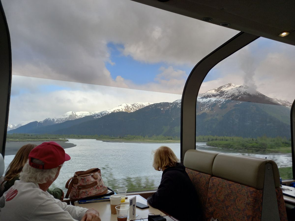With one of those panoramic viewing carriages