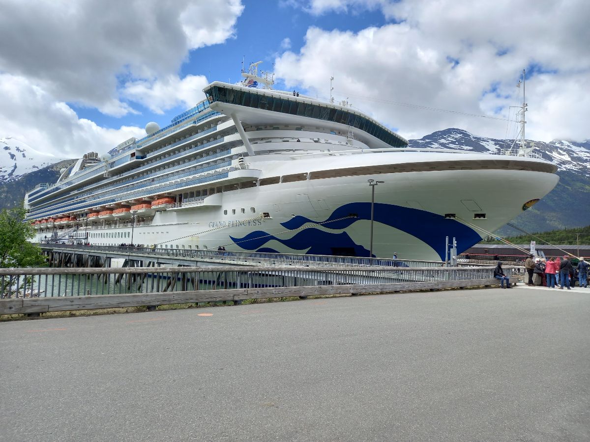 The ship dominates the town