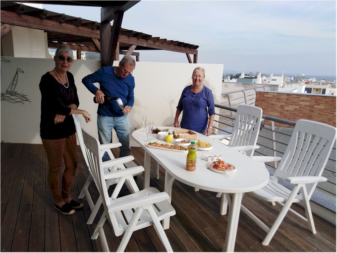 Willi and Gloria joined us for Christmas dinner - entrees on the balcony...